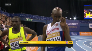 Mo Farah kisses the Union Jack pre-race