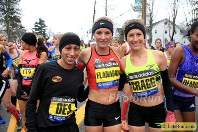 Flanagan and Cragg with Desi Linden before this year's Boston Marathon