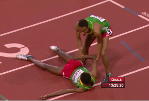 Kejelcha (on ground) was exhausted after winning World Juniors at Hayward last year