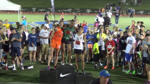 Grant Fisher (r) after breaking four