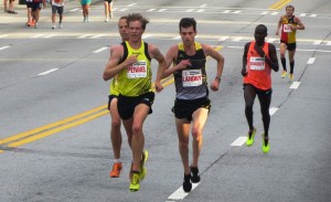 Aaron Braun, Tyler Pennel, Christo Landry, Shadrack Biwott and Jake Riley competing at the 2014 AJC Peachtree Road Race which hosted the USA 10-K road running championships that year (photo by Chris Lotsbom for Race Results Weekly)