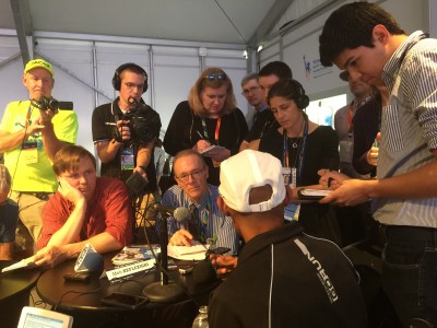 Meb Keflezighi is surrounded by the media