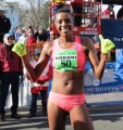 Diane Nukuri celebrating her second consecutive win at the 2015 Manchester Road Race (photo by Jane Monti for Race Results Weekly)