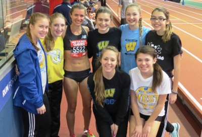 Kim Conley poses with the girls track team of West Seneca West schools (West Seneca, N.Y.) after winning the 2016 New Balance Games invitational mile (photo by David Monti for Race Results Weekly)
