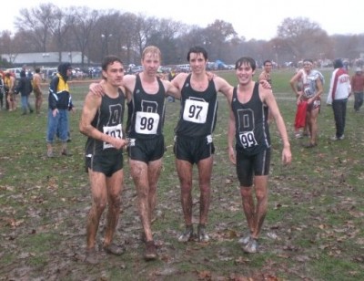 Zablocki (far left) and the author (second from left) after a muddy NCAA Northeast Regional in 2009