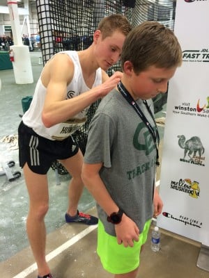 Hunter signed an autograph after breaking Cheserek's record