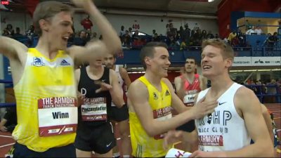 Hunter celebrates moments after the scoreboard confirmed his sub-4:00