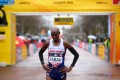 Farah looked like this after being beaten by Kamworor at the World half