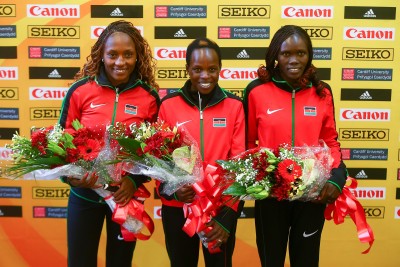 "CARDIFF, WALES - MARCH 26: Gold medalist Peres Jepchirchir of Kenya (C), Silver medalist Cynthia Jerotich Limo of Kenya (R) and Bronze medalist Mary Wacera Ngugi of Kenya (L) after winning the Women's Half Marathon during the IAAF/Cardiff University World Half Marathon Championships on March 26, 2016 in Cardiff, Wales. (Photo by Jordan Mansfield/Getty Images for IAAF)"