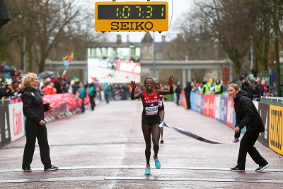 "CARDIFF, WALES - MARCH 26: Peres Jepchirchir of Kenya crosses the line to win the Women's Half Marathon during the IAAF/Cardiff University World Half Marathon Championships on March 26, 2016 in Cardiff, Wales. (Photo by Jordan Mansfield/Getty Images for IAAF)"