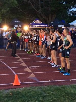 Top heat of the men's mile getting final instructions