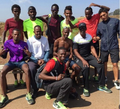 Aden and some of his athletes in Africa