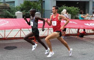 Sam Chelanga (left) battles eventual champion Ryan Hill at the 2016 USA 5-K Championships in Providence, R.I. (photo by Chris Lotsbom for Race Results Weekly)