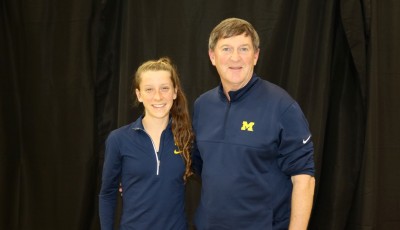 Erin Finn with Michigan coach Mike McGuire in advance of the 2016 NCAA Division I Cross Country Championships in Terre Haute, Ind. (photo by Chris Lotsbom for Race Results Weekly)