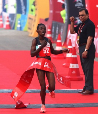 Degefa winning in New Delhi. Photo courtesy of ADHM / Procam International.