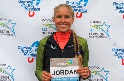 Jordan Hasay shows off her name bib ahead of Sunday's Aramco Houston Half-Marathon where she will make her debut at the distance (photo by David Monti for Race Results Weekly)