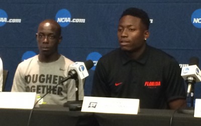 Holloway (right) at Friday's NCAA press conference