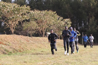 Kipchoge (front right) cooling down