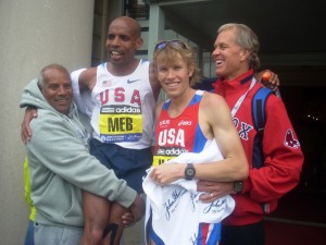 PHOTO: Meb Keflezighi and Ryan Hall with their fathers, Russom and Mickey, after the 2010 Boston Marathon (photo by Chris Lotsbom for Race Results Weekly).