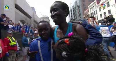 Kiplagat celebrates with some of her children