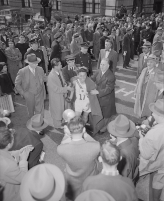 Tanaka after crossing the finish line in Boston. Leslie Jones/Boston Public Library.