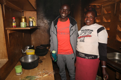 Kipchoge with the Global camp's cook, Mary. Photo courtesy Jean-Pierre Durand for the IAAF.