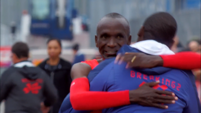 Kipchoge hugs Sang