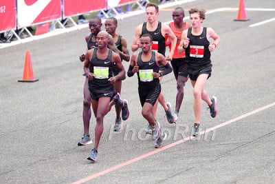 Chris Derrick (tall guy in center) and Andrew Bumbalough (far right) pace Eliud Kipchoge