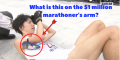 He won $936,000 for running a 2_06_11 marathon. The only remaining question is what is this on his arm_ (1)