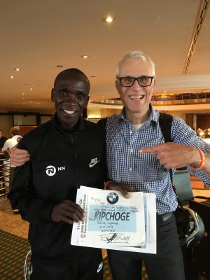 Kipchoge presented "Drinks Guy" with a signed bib the day after his record run