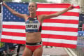 Jenny Simpson celebrates after winning the 38th New Balance Fifth Avenue Mile in New York (photo by Jane Monti for Race Results Weekly)