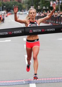 Emily Sisson winning the 2018 Reebok Boston 10-K for Women in 30:30 (photo courtesy of Conventures)