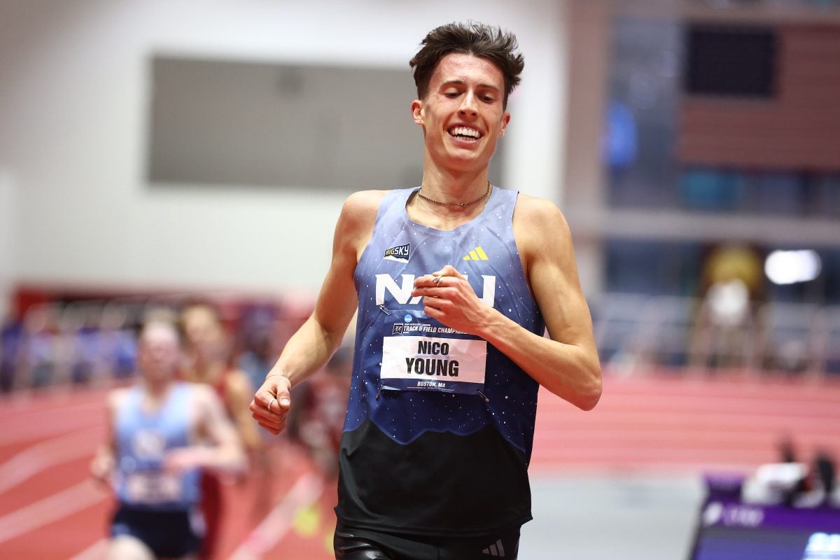 Nico Young smiles after crossing line to win the NCAA 5000m title (Kevin Morris photo)