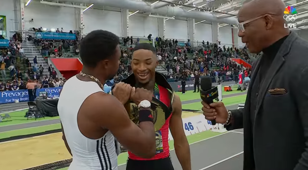 Noah Lyles hands Jordan Anthony the championship belt