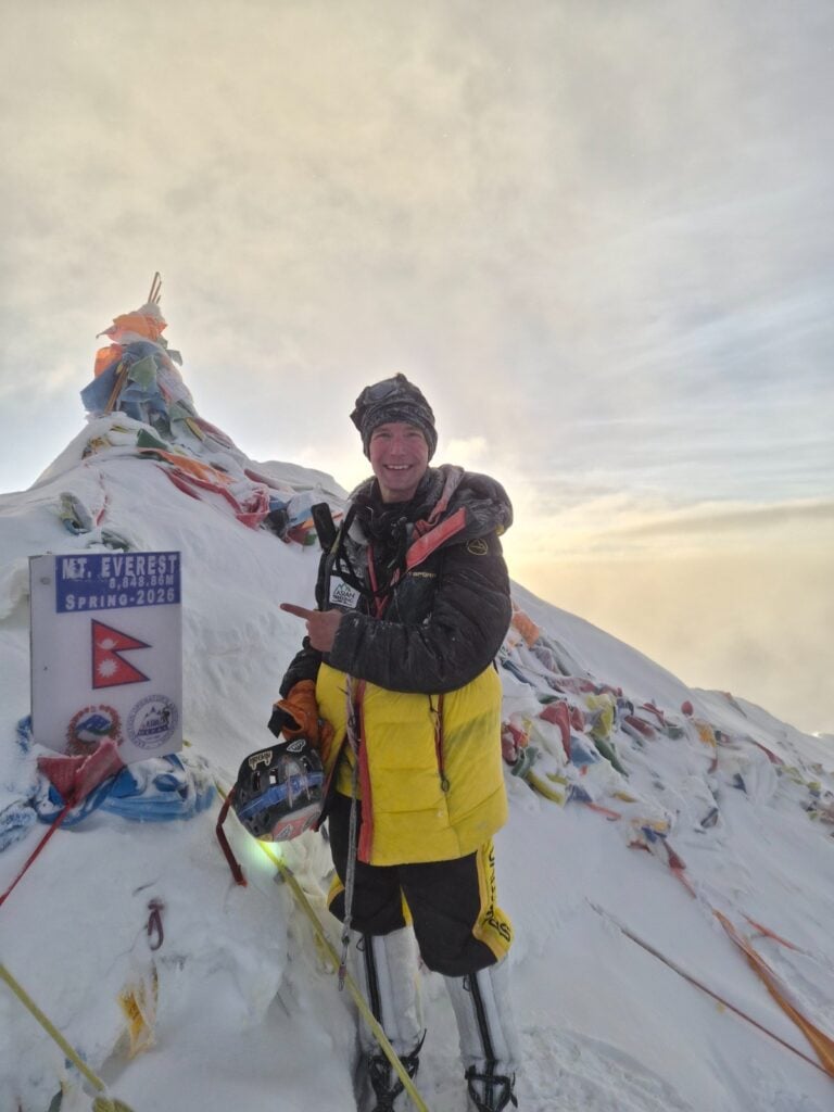 Tyler Andrews at the top of Mt. Everest